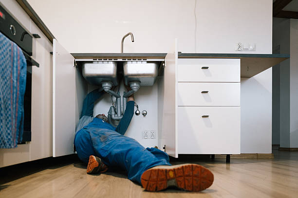 Professional Plumbing technician working in Combs, AR
